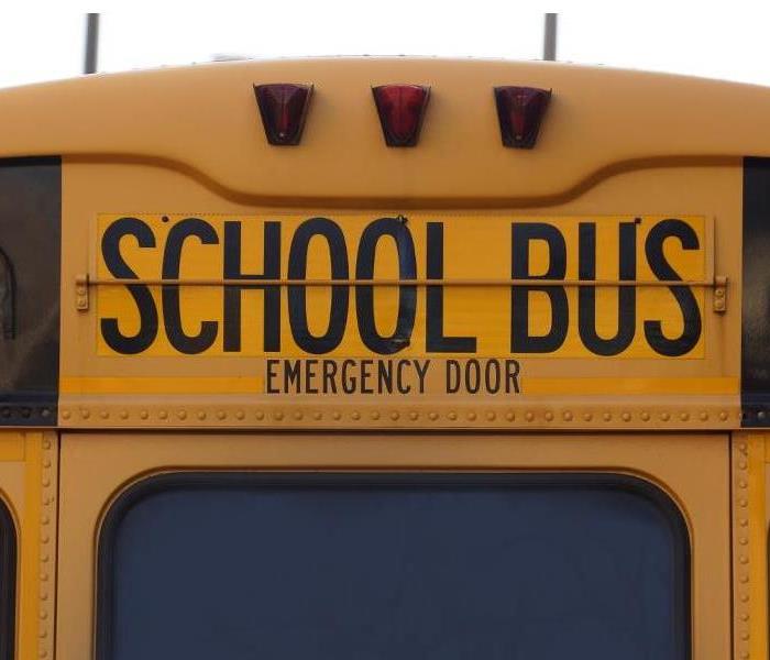 The back of a school bus/emergency door