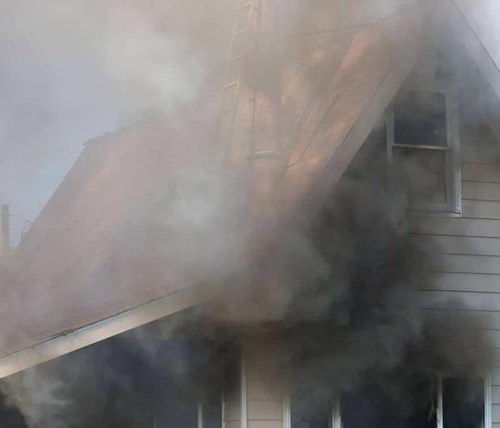 smoke coming from house