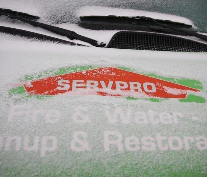 snow on a SERVPRO pickup truck