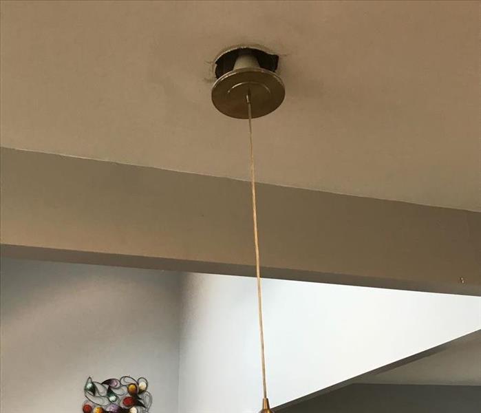 kitchen ceiling light falling from water damage